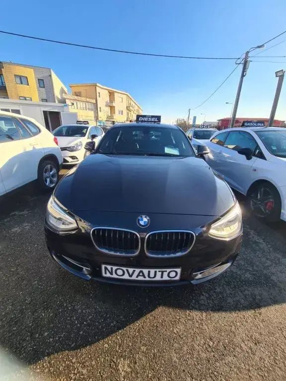 Preto Usado 2014 BMW 118 Sport Line Citadino | € 14.900 (Preço justo) - Imagem 1/4