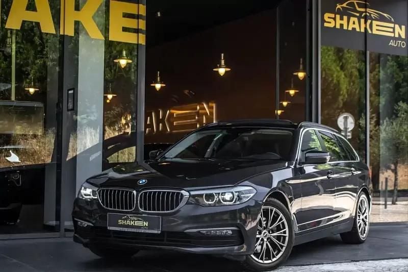 Cinzento Usado 2018 BMW 520 Luxury Line Carrinha | € 23.990 (Preço justo) - Imagem 1/4