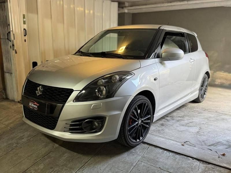 Cinzento Usado 2014 Suzuki Swift | € 12.900 - Imagem 1/4