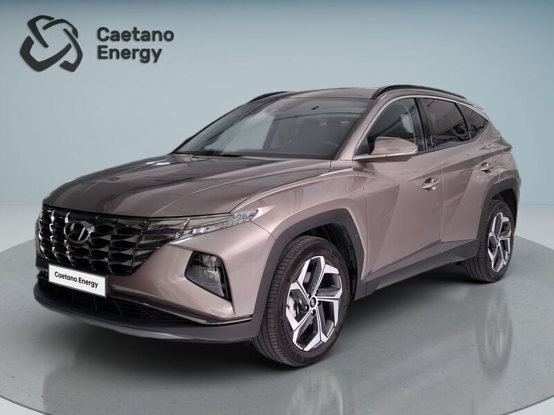 Silky bronze (metalizado) Usado 2024 Hyundai Tucson Premium SUV | € 36.500 (Preço elevado) - Imagem 1/4