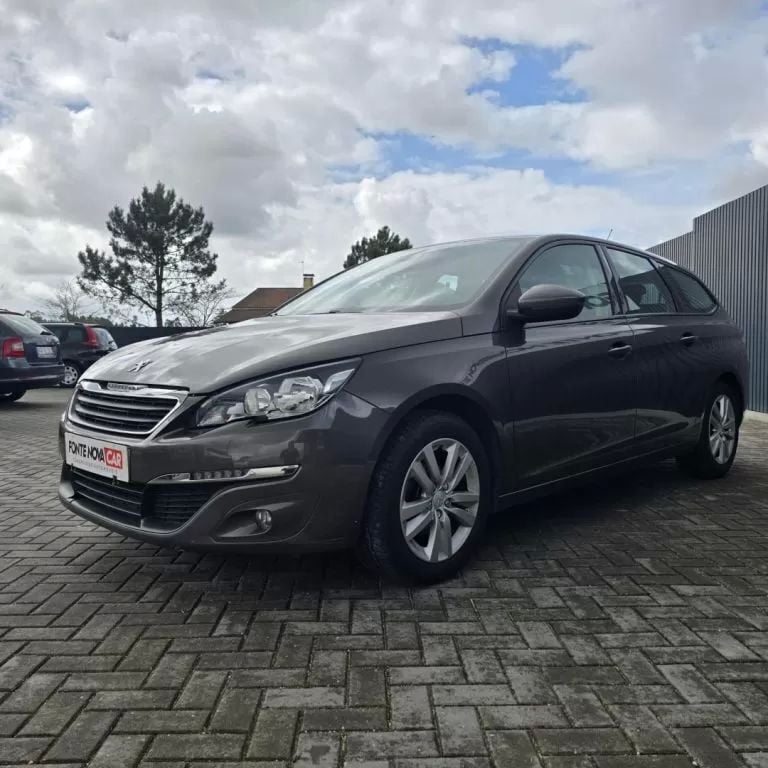 Castanho Usado 2015 Peugeot 308 Allure Carrinha | € 11.650 (Preço elevado) - Imagem 1/4