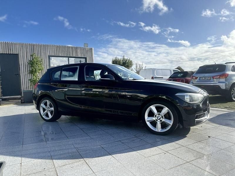 Preto Usado 2013 BMW 118 Citadino | € 10.750 (Preço justo) - Imagem 1/4
