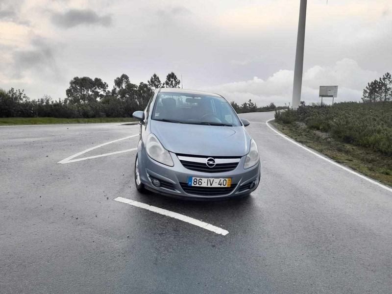 Usado Opel Corsa 86 HP (63 kW) 2010 Cinzento Citadino