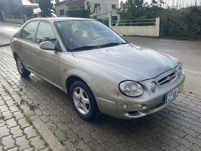 Usado 2000 Kia Shuma Citadino | € 1.065 - Imagem 1/4