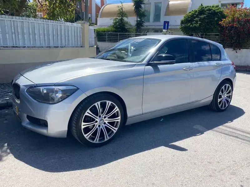 Cinzento Usado 2013 BMW 116 Sport Line Citadino | € 12.950 (Preço elevado) - Imagem 1/4