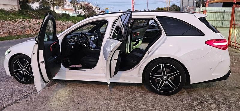 Usado Mercedes C300 AMG line 265 HP (194 kW) 2023 Branco Carrinha