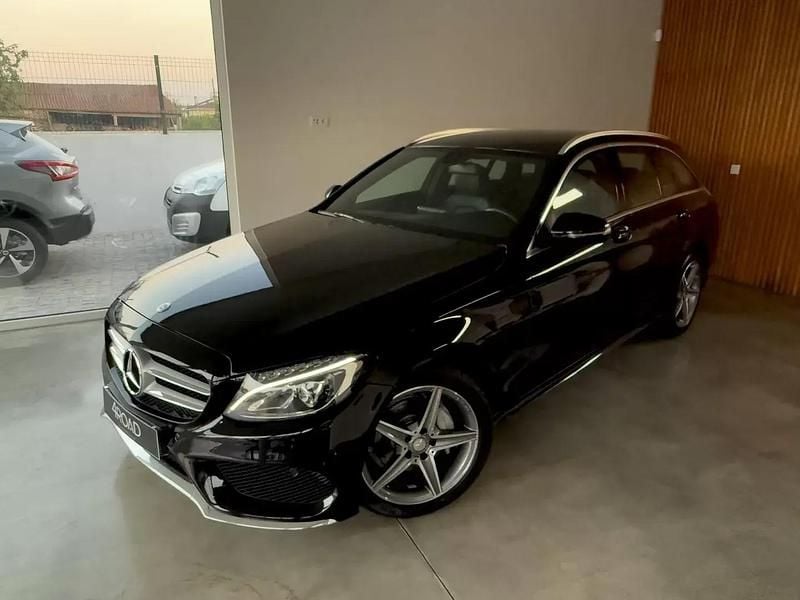 Usado Mercedes C200 AMG line 136 HP (100 kW) 2015 Preto Carrinha