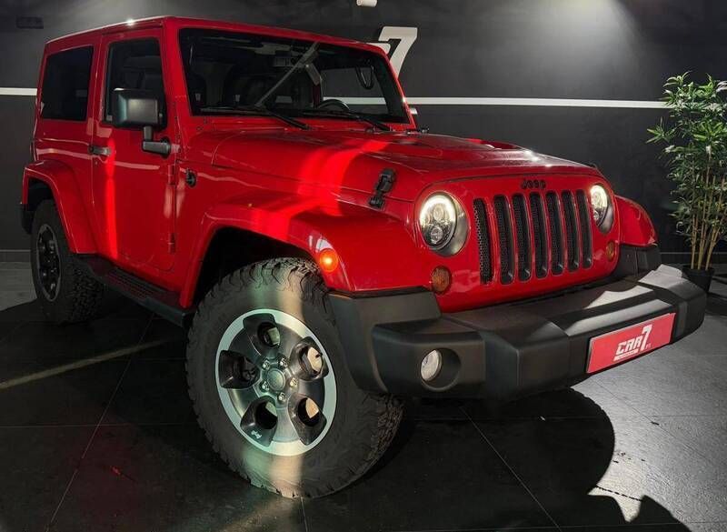 Vermelho Usado 2015 Jeep Wrangler Sahara SUV | € 42.990 (Preço justo) - Imagem 1/4