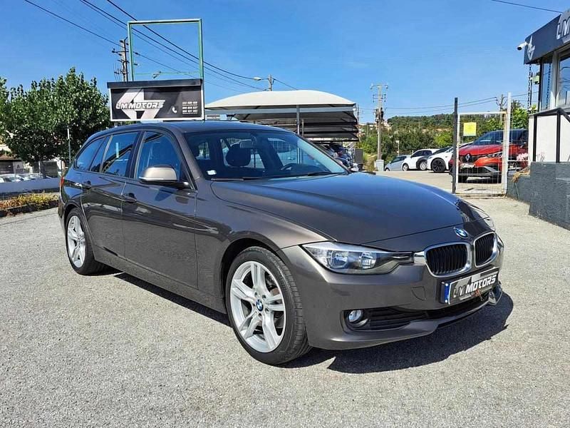 Castanho Usado 2014 BMW 316 Advantage Carrinha | € 12.950 (Preço justo) - Imagem 1/4