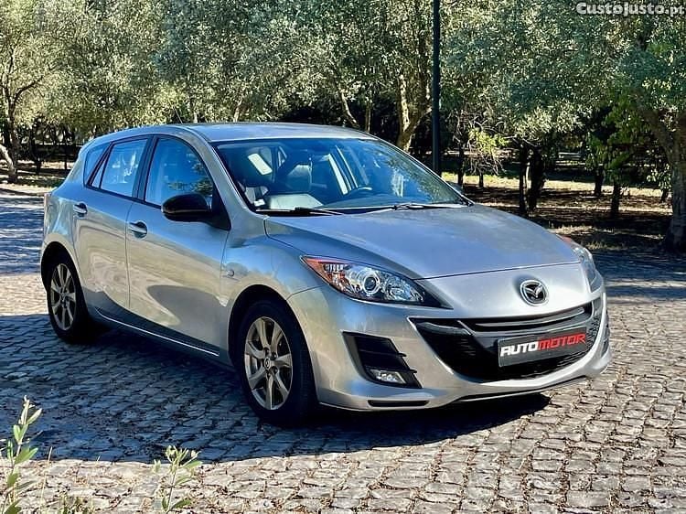 Cinza Usado 2009 Mazda 3 Inclusive Citadino | € 5.990 - Imagem 1/1