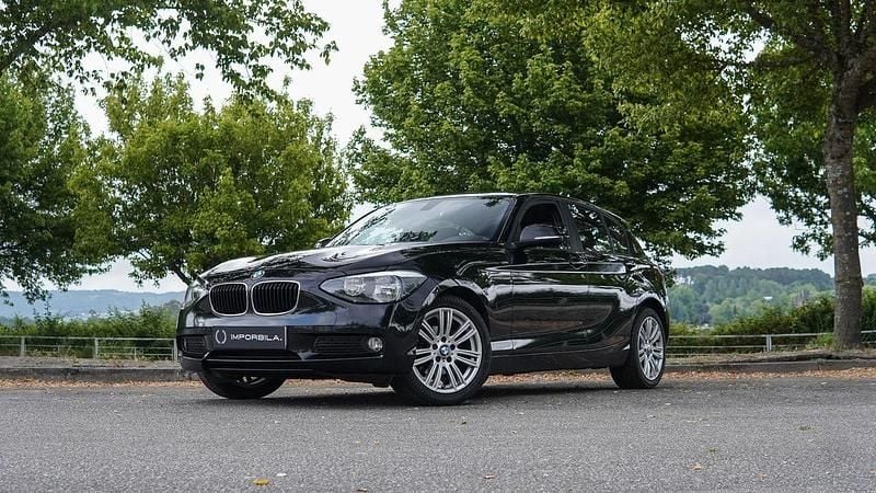 Preto Usado 2012 BMW 118 Citadino | € 12.500 (Preço justo) - Imagem 1/4