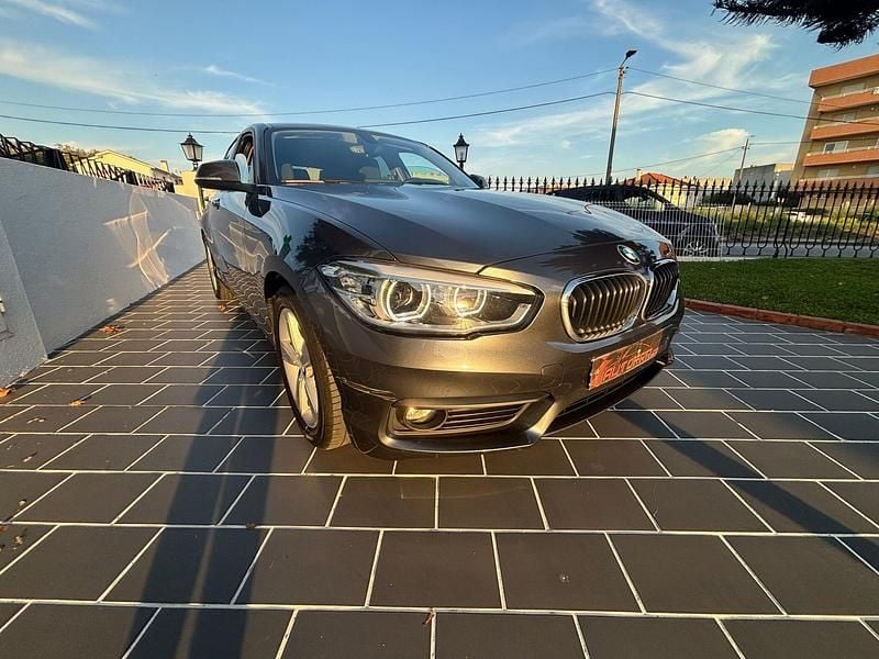 Cinza Usado 2015 BMW 116 Efficient Dynamics Citadino | € 12.900 - Imagem 1/4