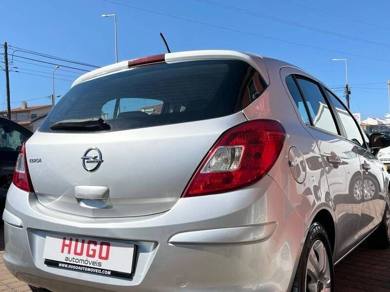 Usado Opel Corsa Cosmo 85 HP (62 kW) 2011 Cinza Citadino
