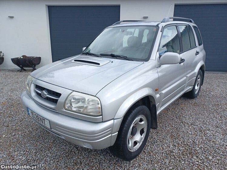 Cinza Usado 1999 Suzuki Vitara SUV | € 7.500 - Imagem 1/1