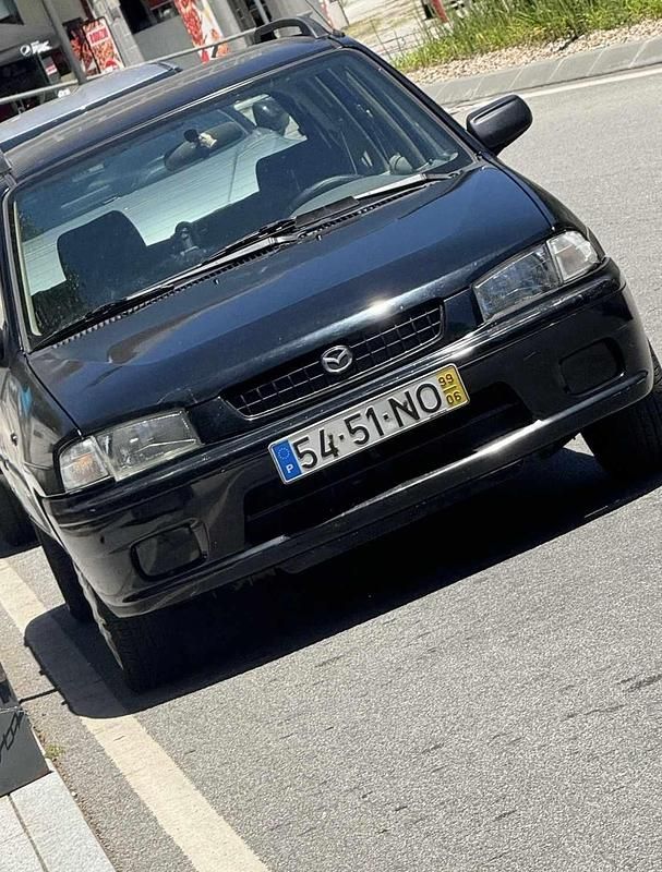 Usado Mazda Demio 72 HP (52 kW) 1999 Preto Citadino