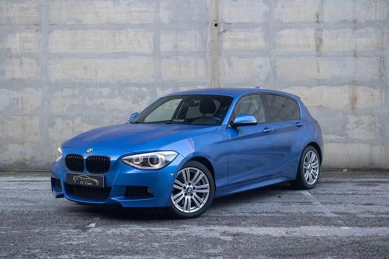 Azul Usado 2013 BMW 118 Comfort Edition Citadino | € 14.990 (Preço justo) - Imagem 1/4