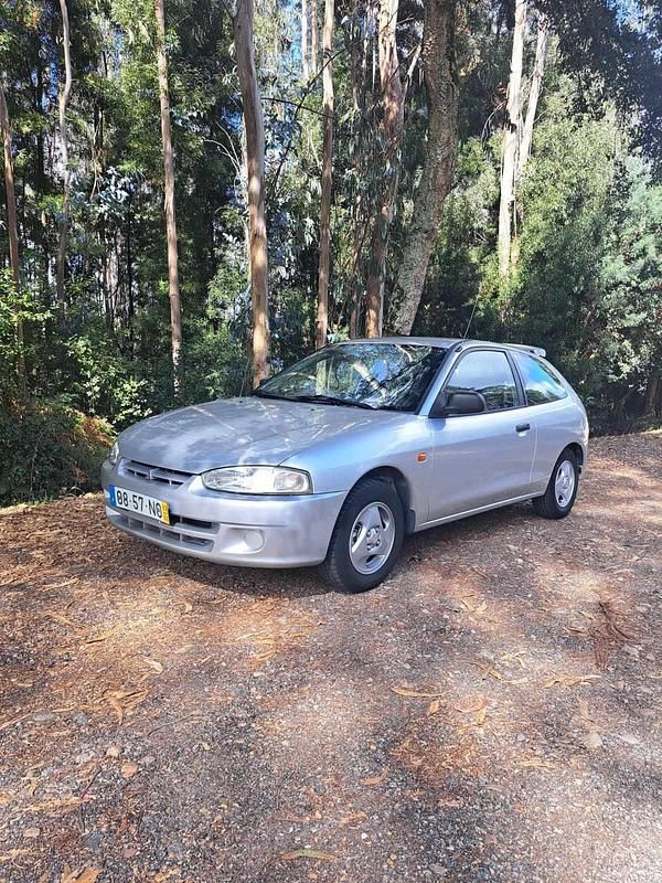 Cinzento Usado 1999 Mitsubishi Colt Citadino | € 2.250 - Imagem 1/4