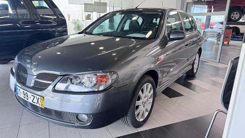Cinza Usado 2005 Nissan Almera Citadino | € 4.500 - Imagem 1/4