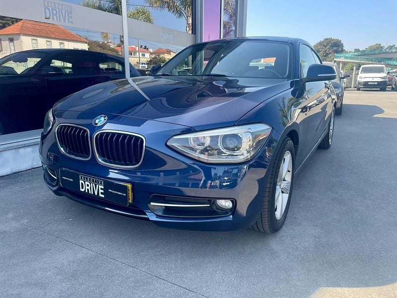 Azul Usado 2014 BMW 116 Sport Line Citadino | € 11.900 - Imagem 1/4
