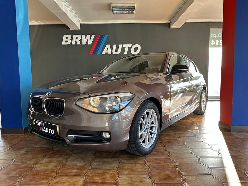 Castanho Usado 2013 BMW 116 Sport Line Citadino | € 12.990 - Imagem 1/4