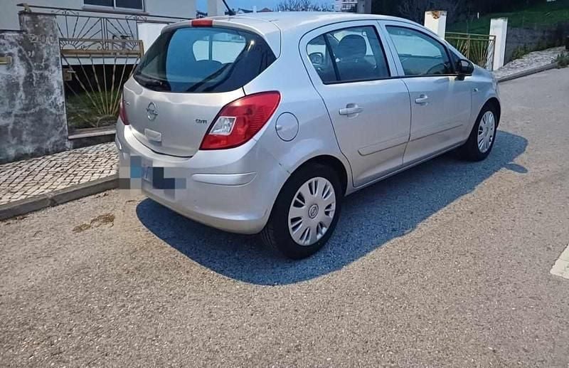 Usado Opel Corsa 75 HP (55 kW) 2007 Cinzento Citadino