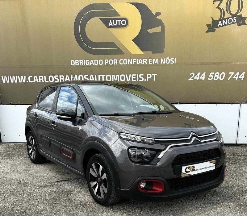 Cinzento platina/tecto preto e Usado 2022 Citroën C3 PureTech Citadino | € 15.900 (Preço elevado) - Imagem 1/4