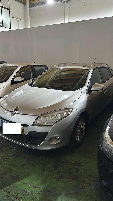 Usado Renault Mégane III 106 HP (77 kW) 2012 Cinzento Carrinha