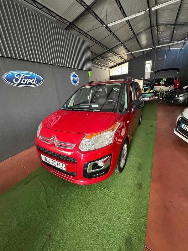 Vermelho Usado 2016 Citroën C3 Picasso Monovolume | € 7.900 - Imagem 1/4