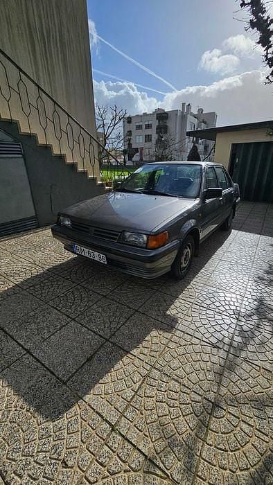 Usado Nissan Sunny 60 HP (44 kW) 1987 Cinzento Sedan