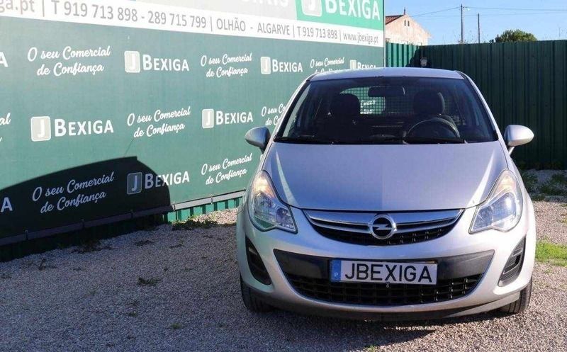 Usado Opel Corsa 75 HP (55 kW) 2011 Cinzento Citadino