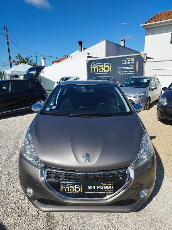 Castanho Usado 2015 Peugeot 208 Style Citadino | € 8.650 (Preço justo) - Imagem 1/4