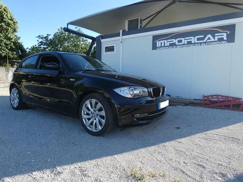 Preto Usado 2009 BMW 118 Sport Line Citadino | € 10.750 (Preço justo) - Imagem 1/4