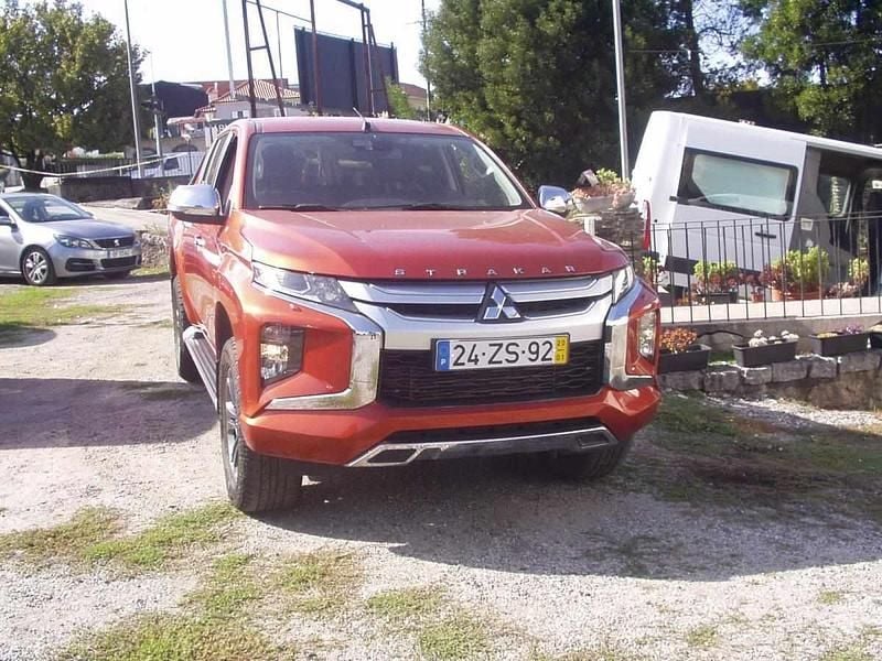 Laranja Usado 2020 Mitsubishi L200 Invite Pickup | € 28.990 (Bom preço) - Imagem 1/4