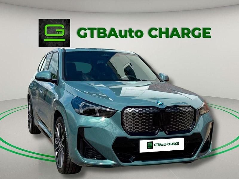 Verde Usado 2024 BMW iX1 M Sport SUV | € 53.499 (Preço justo) - Imagem 1/4