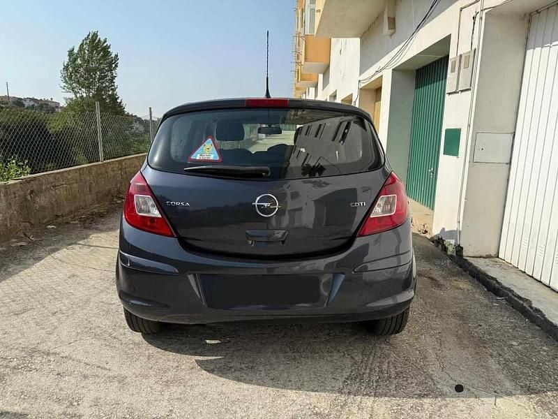 Usado Opel Corsa 75 HP (55 kW) 2007 Cinzento Citadino