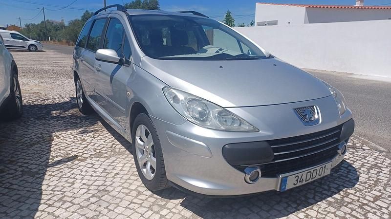 Cinza prata Usado 2007 Peugeot 307 Carrinha | € 6.980 - Imagem 1/4