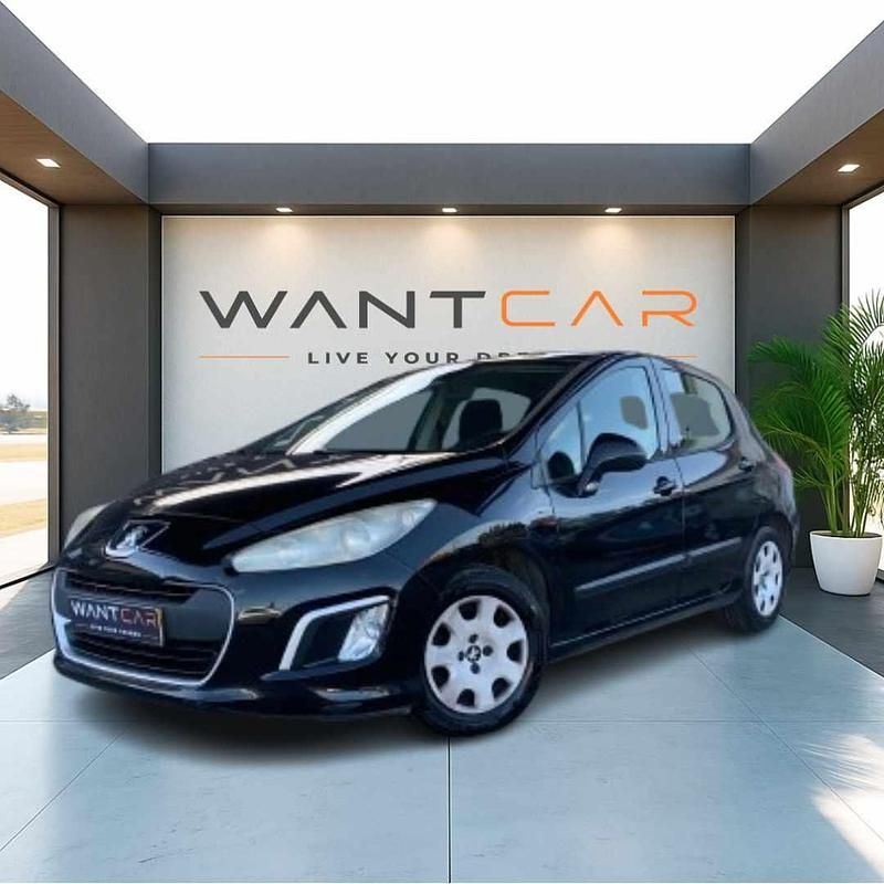 Preto Usado 2012 Peugeot 308 Citadino | € 7.900 (Preço justo) - Imagem 1/4
