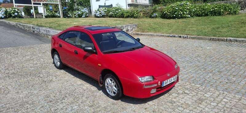 Vermelho Usado 1996 Mazda 323 | € 1.400 - Imagem 1/4