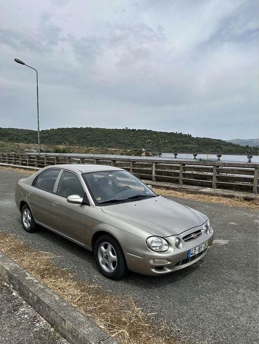 Usado 1999 Kia Shuma Citadino | € 1.500 - Imagem 1/4