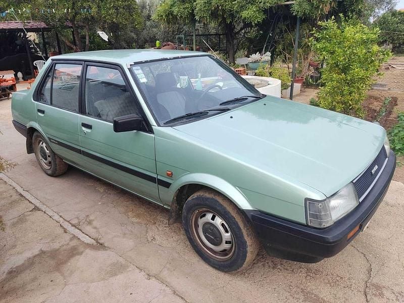 Usado 1985 Toyota Corolla Sedan | € 1.500 - Imagem 1/4