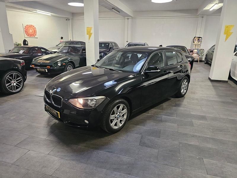 Preto Usado 2014 BMW 116 Efficient Dynamics Citadino | € 14.500 - Imagem 1/4