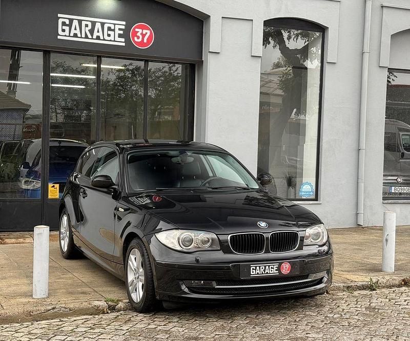 Preto Usado 2008 BMW 118 Citadino | € 9.490 (Preço justo) - Imagem 1/4