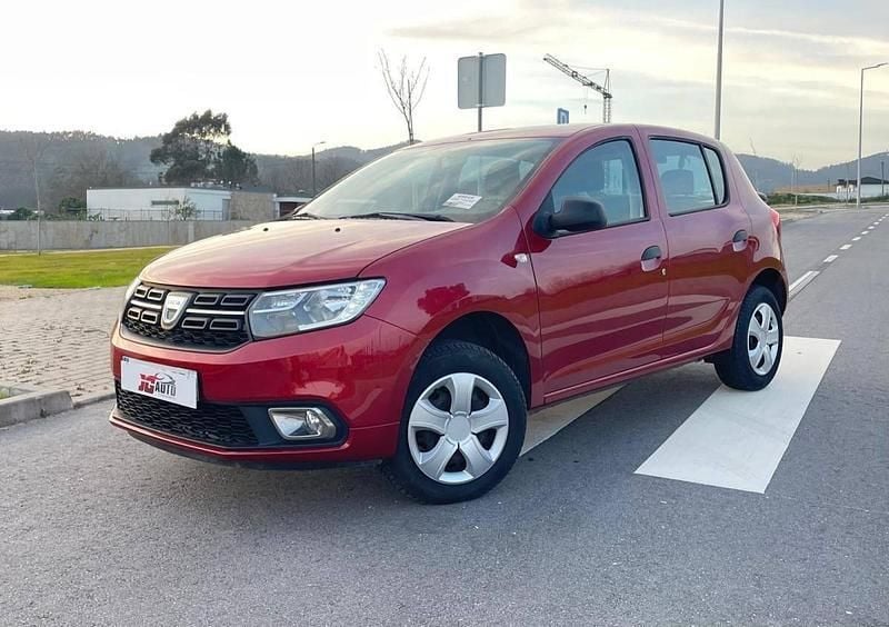 Vermelho Usado 2015 Dacia Sandero Comfort Citadino | € 8.400 (Bom preço) - Imagem 1/4