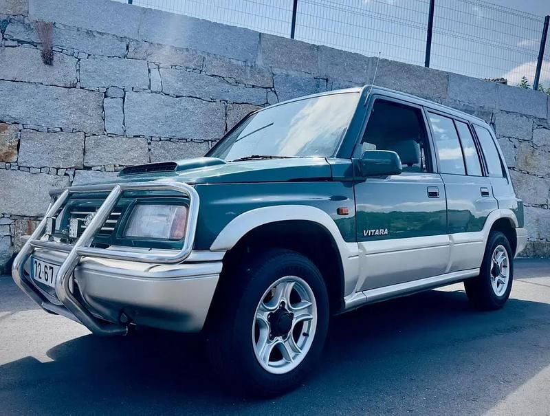 Verde Usado 1997 Suzuki Vitara SUV | € 5.500 - Imagem 1/4