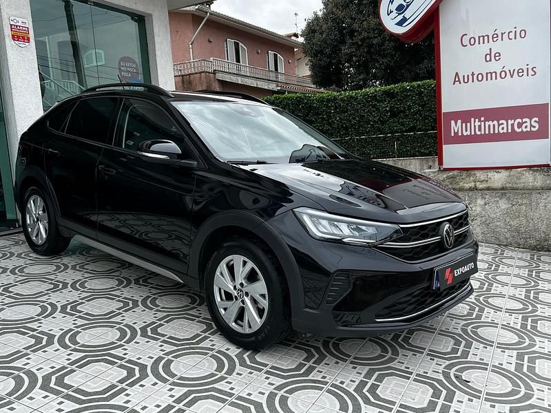 Usado VW Taigo 95 HP (69 kW) 2024 Preto cinzento SUV