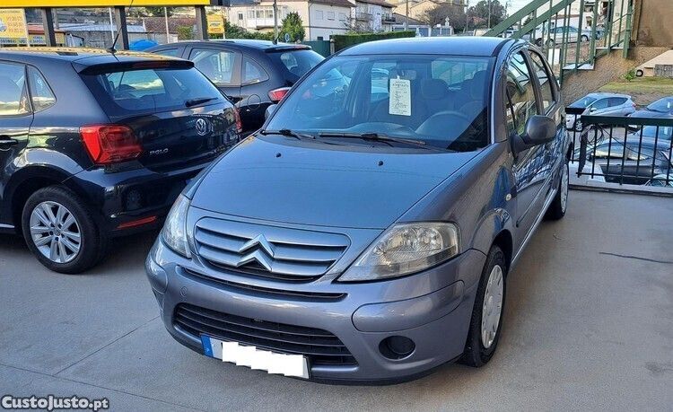 Cinza Usado 2010 Citroën C3 Seduction Citadino | € 6.250 (Preço justo) - Imagem 1/1