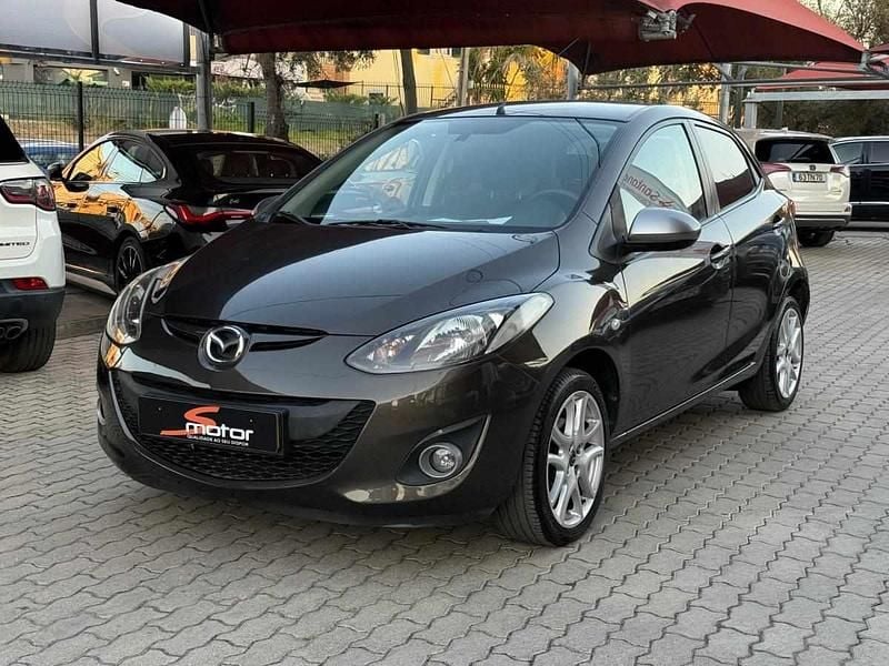 Cinza Usado 2014 Mazda 2 | € 9.950 - Imagem 1/4