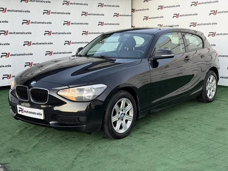Preto Usado 2013 BMW 114 Urban Line Citadino | € 9.490 - Imagem 1/4