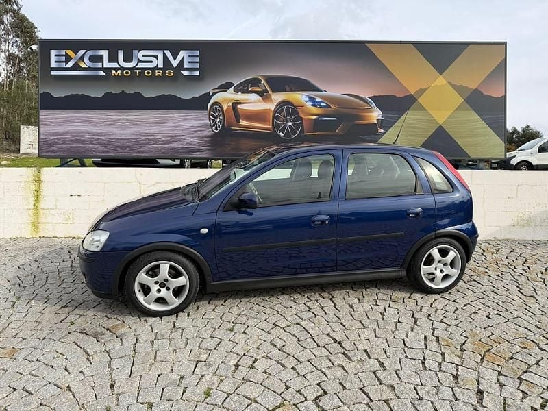 Azul Usado 2005 Opel Corsa Enjoy | € 3.490 (Caro) - Imagem 1/4