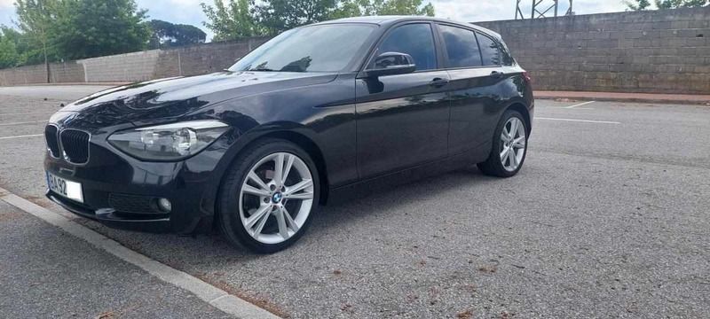 Preto Usado 2013 BMW 116 Citadino | € 12.800 - Imagem 1/4